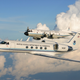A NOAA WP-3D and the Gulfstream IV fly in formation. NOAA photo